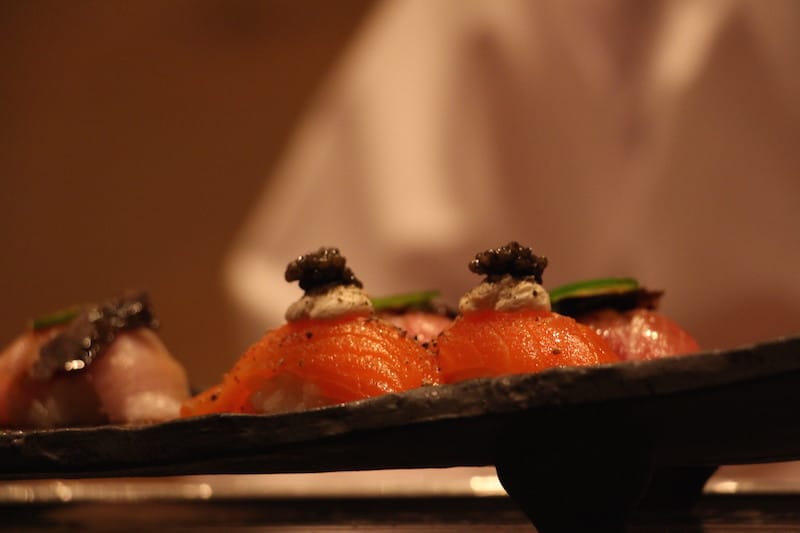 salmon nigiri, crème fraiche, caviar and aioli