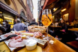 Italian aperitivo with cold meats and spritz.