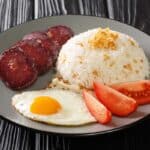 Fried rice with garlic, meat and egg.