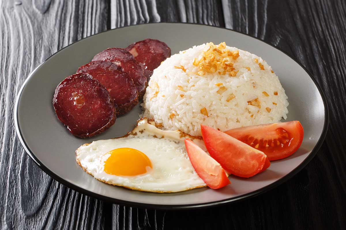 Fried rice with garlic, meat and egg. 