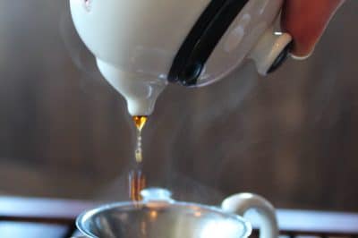 Pouring a steeping of tea during a Gong Fu Tea Tasting. Photo courtesy of Verdant Tea.