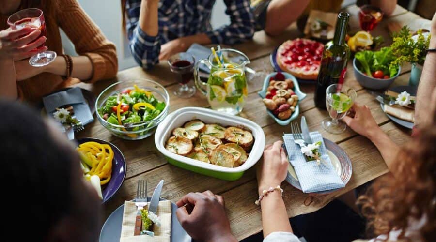 A group of people enjoying a sit down meal.