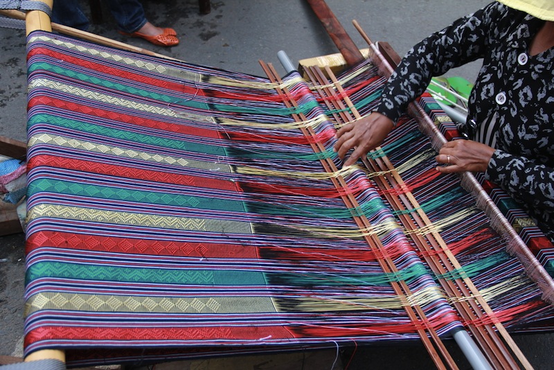 a woman weaving