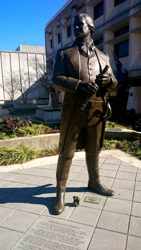 Bronze mouse at the foot of a statue of Greenville's namesake, Nathaniel Greene.  Photo courtesy of Katie Foote.