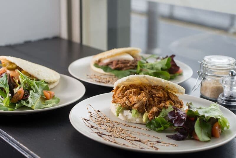 pulled pork arepa at Cento mani cafe