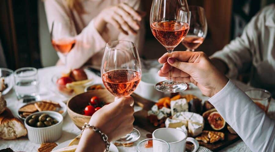 Saying cheers in a French restaurant.