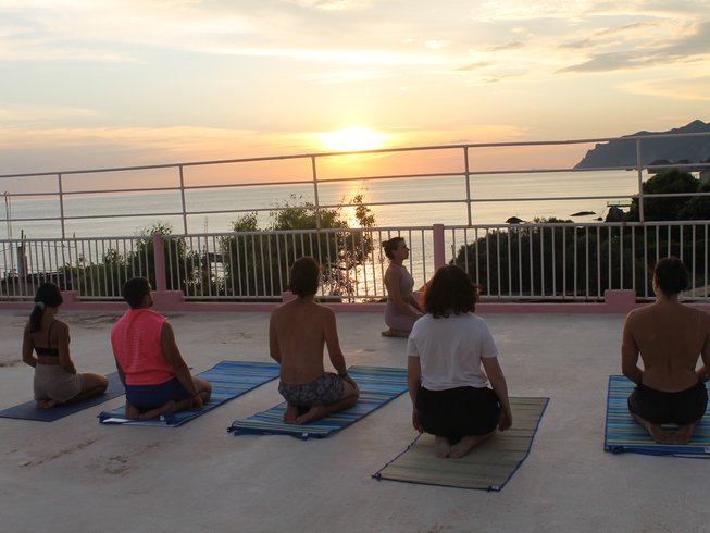 rooftop yoga on a hiking wellness retreat in Greece