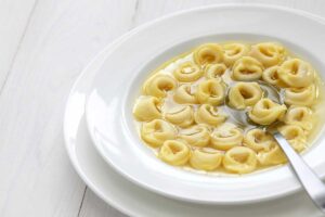 Tortellini in brodo, an italian broth with pasta.