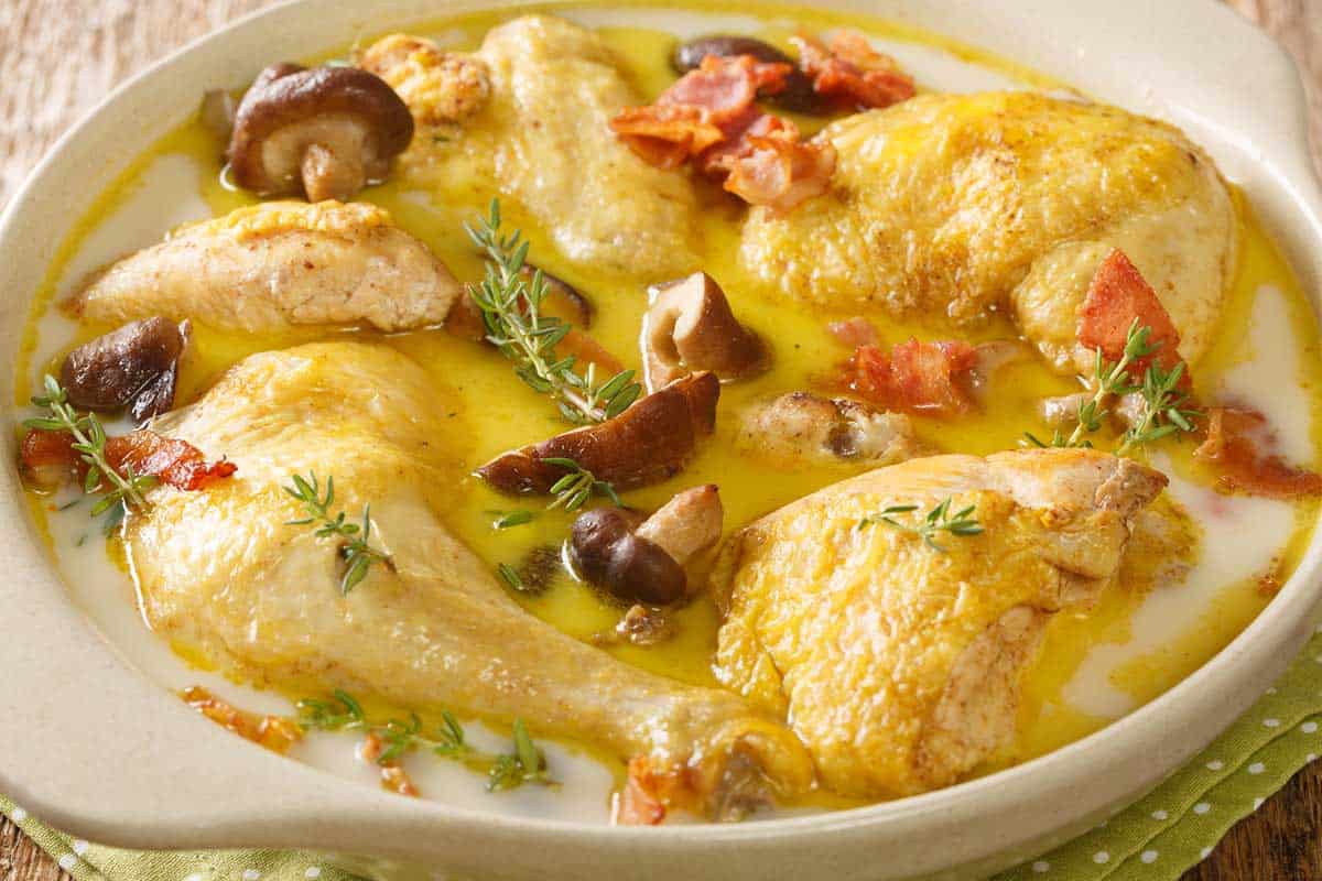 Coq au Riesling, a typical dish from Strasbourg, France.