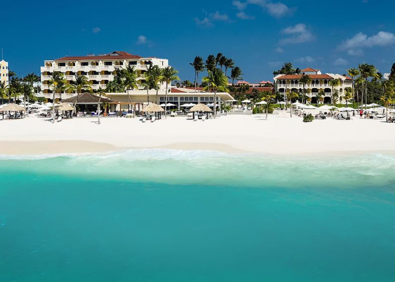 waterfront exterior of Bucuti and Tara Resort, one of the best vegan resorts in the Caribbean