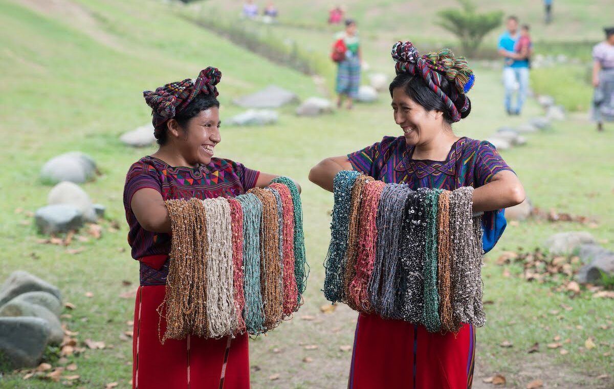 women from the Wakami women’s empowerment artisan group in Guatemala crafting beautiful bracelets