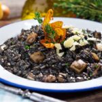 Cuttlefish ink risotto with Parmesan cheese, a staple food in Istria