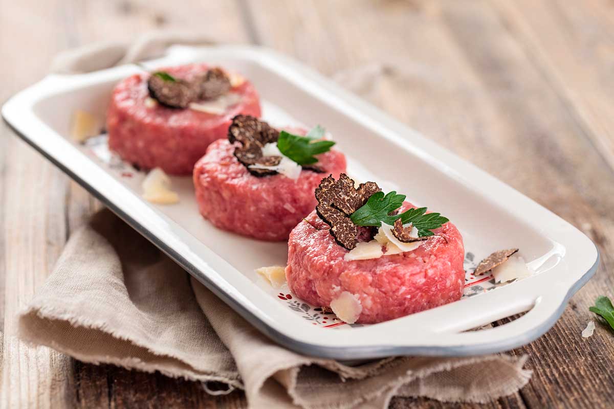 Steak tartare with black truffles.