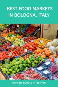 Pinterest pin that shows a stall with fruits and vegetables in a street market in Bologna.